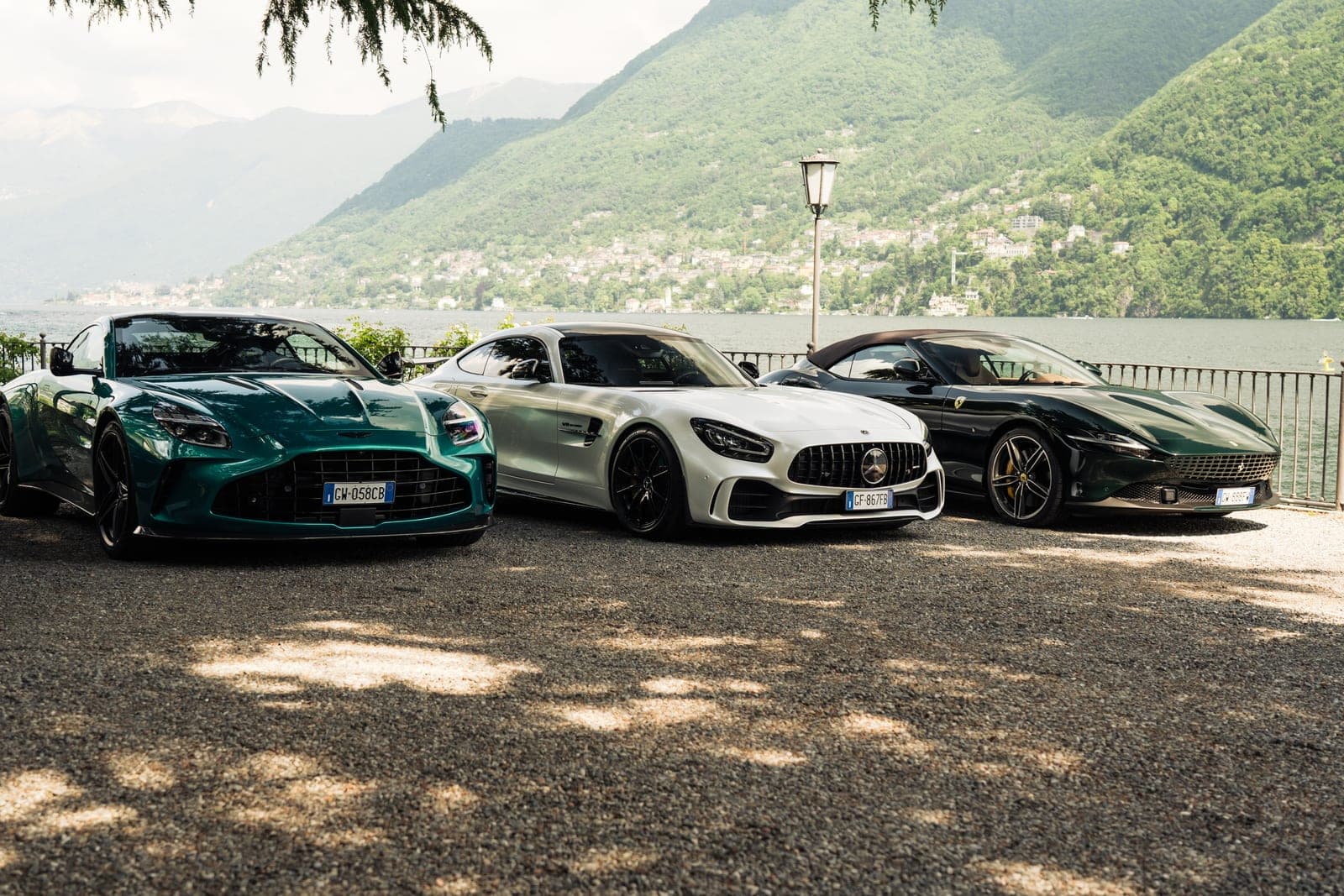 Aston Martin, Mercedes-AMG and Ferrari on the Lake Como shoreline