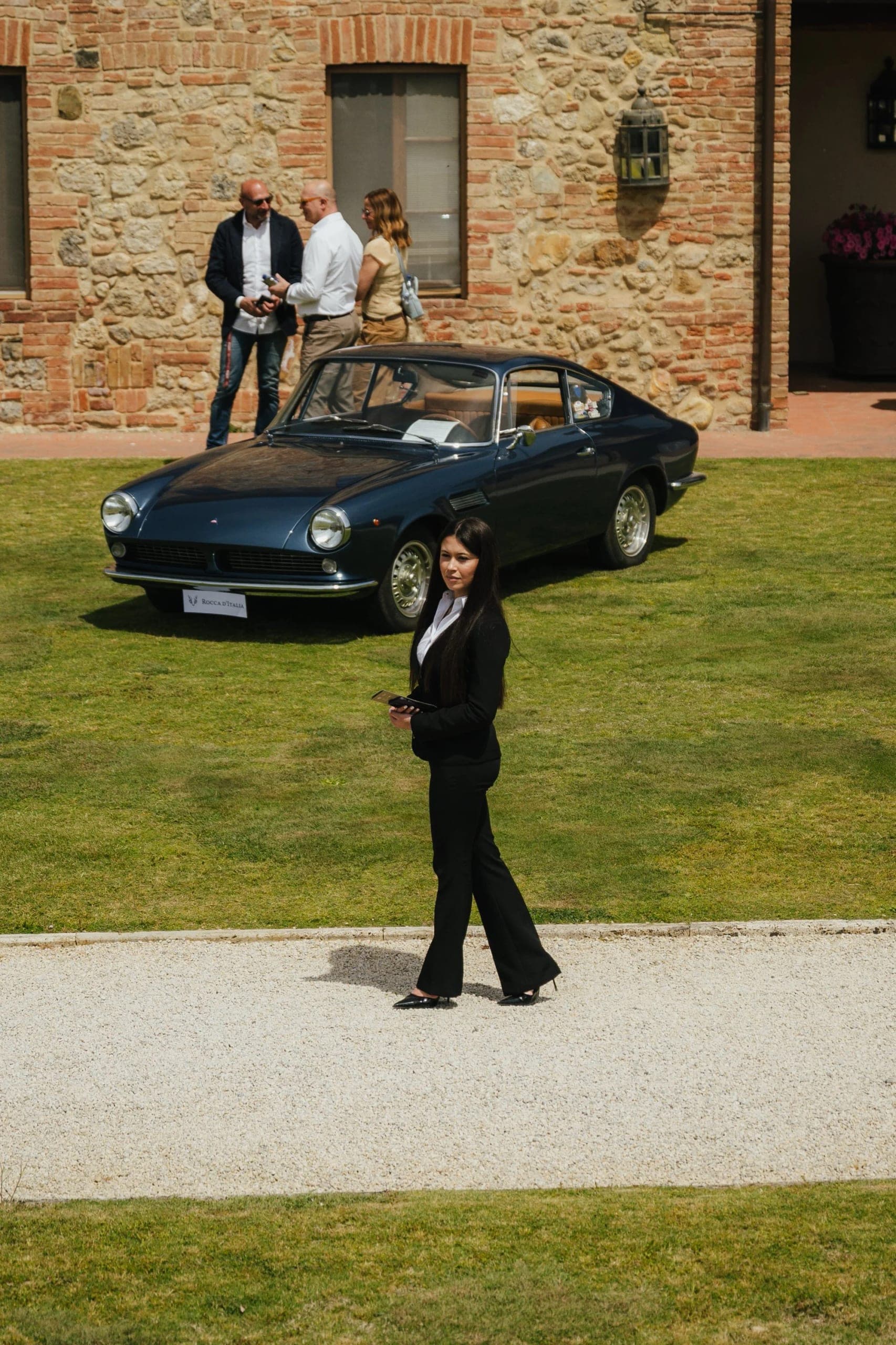 Classic car among the Tuscan hills